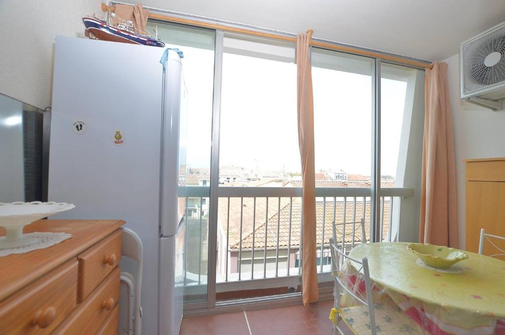 Méditerranée 32 - Appartement T2, immeuble devant la plage, au centre-ville du Grau-du-Roi. 4 personnes - 3