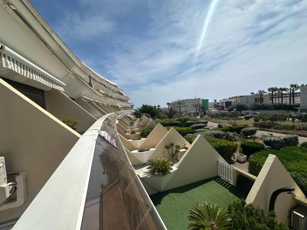 Village naturiste Heliopolis AB 117 vue jardin et mer - 1