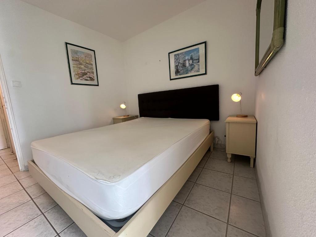 Village naturiste Heliopolis AB 117 vue jardin et mer - 4