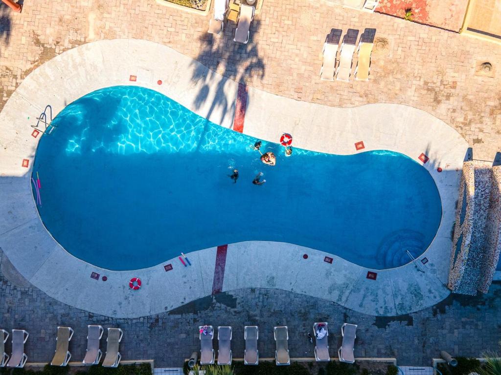 Stunning Pool Condo, 8 Min Walk to the Beach! - 3