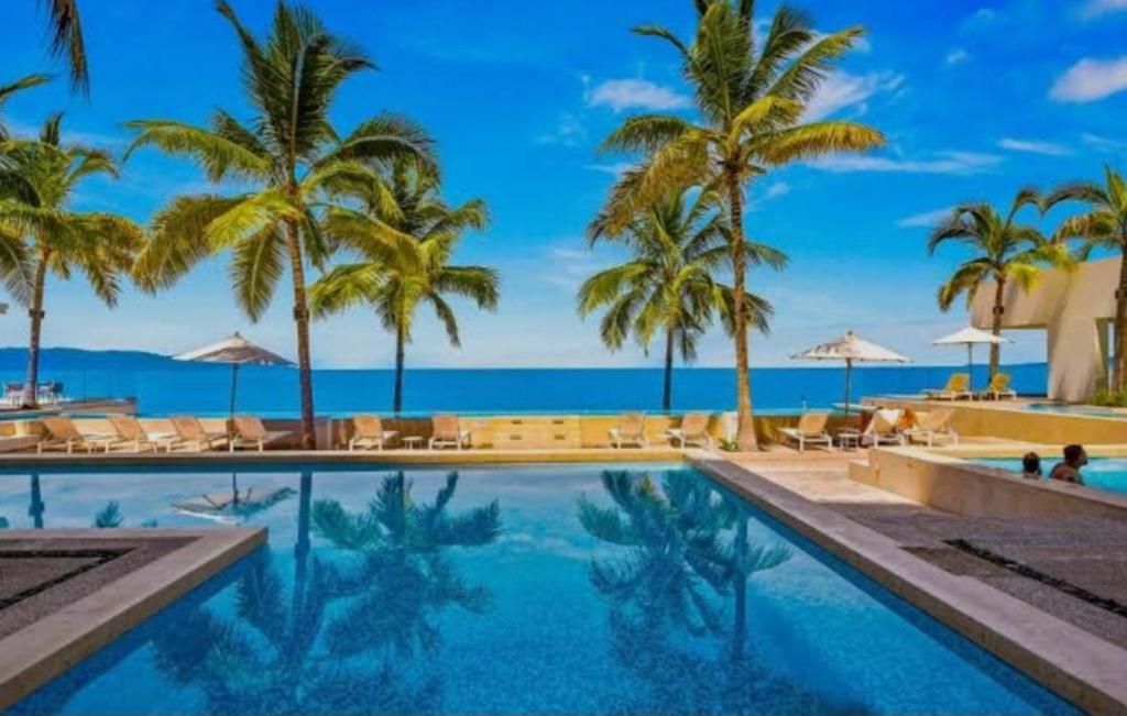 PROMO Beautiful beachfront Apt with pools, jacuzzi, gym - 1
