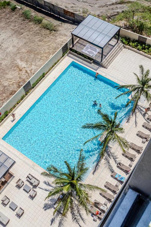 Exclusiva suite moderna con balcón cerca al mar - 1