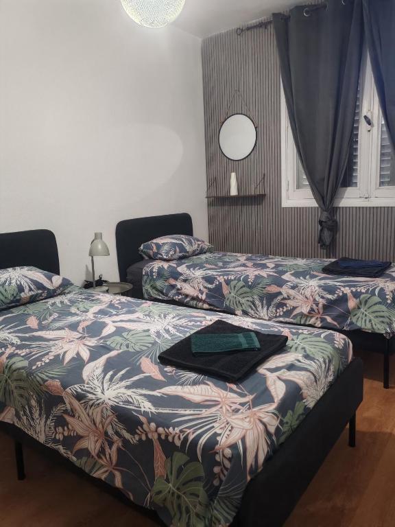 Le Temps d'un Séjour Clermont-Ferrand F3 2 chambres 1 chambre avec 1 lit simple et 1 chambre avec 2 lits doubles et 1 Garage - 3