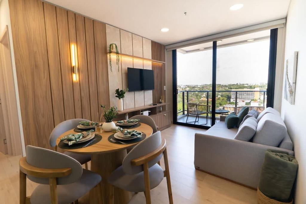 One-Bedroom with Balcony Near Malls Pool and City Views - 1