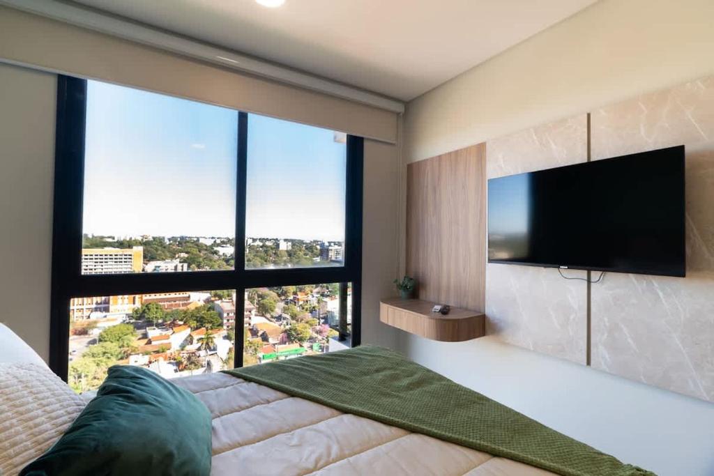 One-Bedroom with Balcony Near Malls Pool and City Views - 2