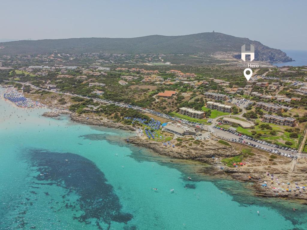 Exclusive Villa Overlooking La Pelosa Beach by Host Hero - 1