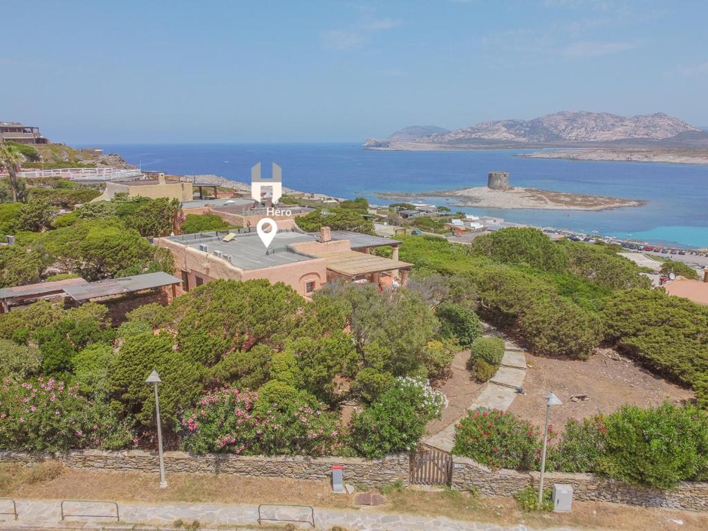 Exclusive Villa Overlooking La Pelosa Beach by Host Hero - 3