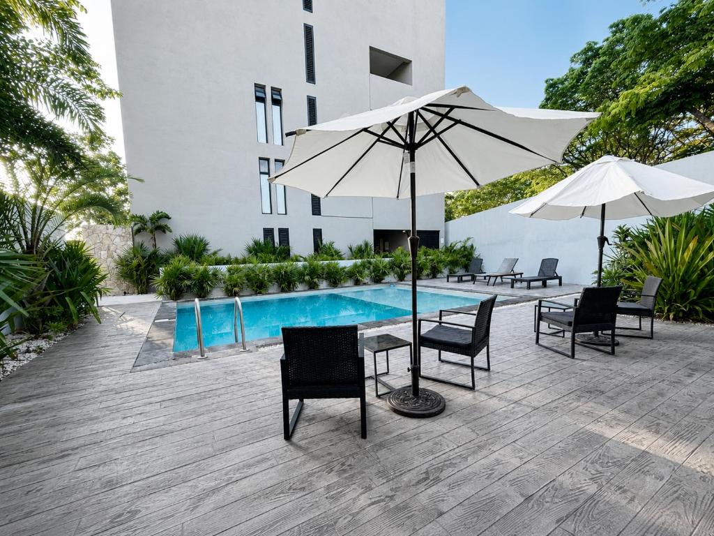 Departamento 2 Recamaras con Workspace, WiFi y Alberca - 3