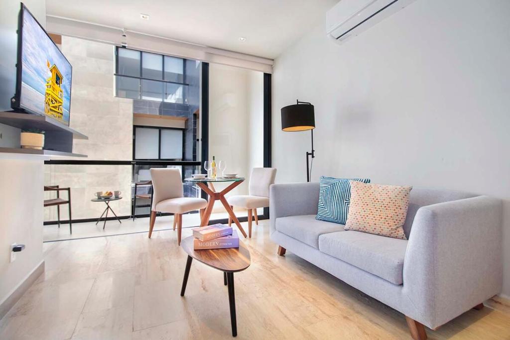 1BR Prime Location with Ocean View Rooftop & Pool - 1