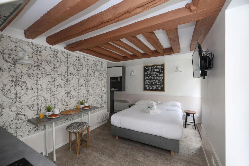 Studio parisien 20m2 en face du musee Grevin - 2P - 1