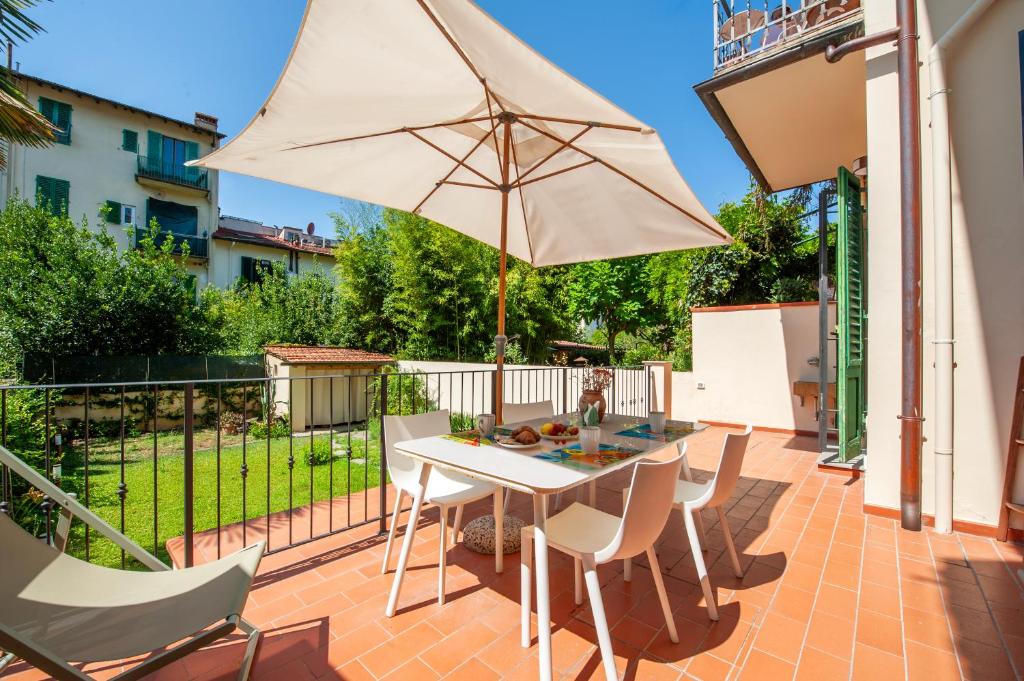 Luminoso Appartamento con Giardino e Terrazza Privati - 2 Camere - Parcheggio Comodo - 4