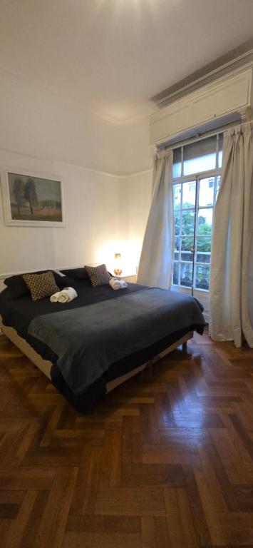 With a balcony overlooking the Obelisco, between Jacarandas and Tango - 2