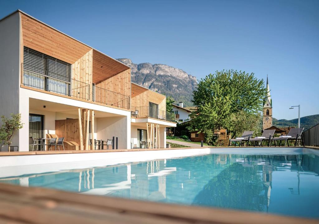 Babioshof - modern, spacious apartments with stunning view, 2 bedrooms & 2 bathrooms, pool & whirlpool, Südtirol Guest Pass in Kaltern-Caldaro - 1