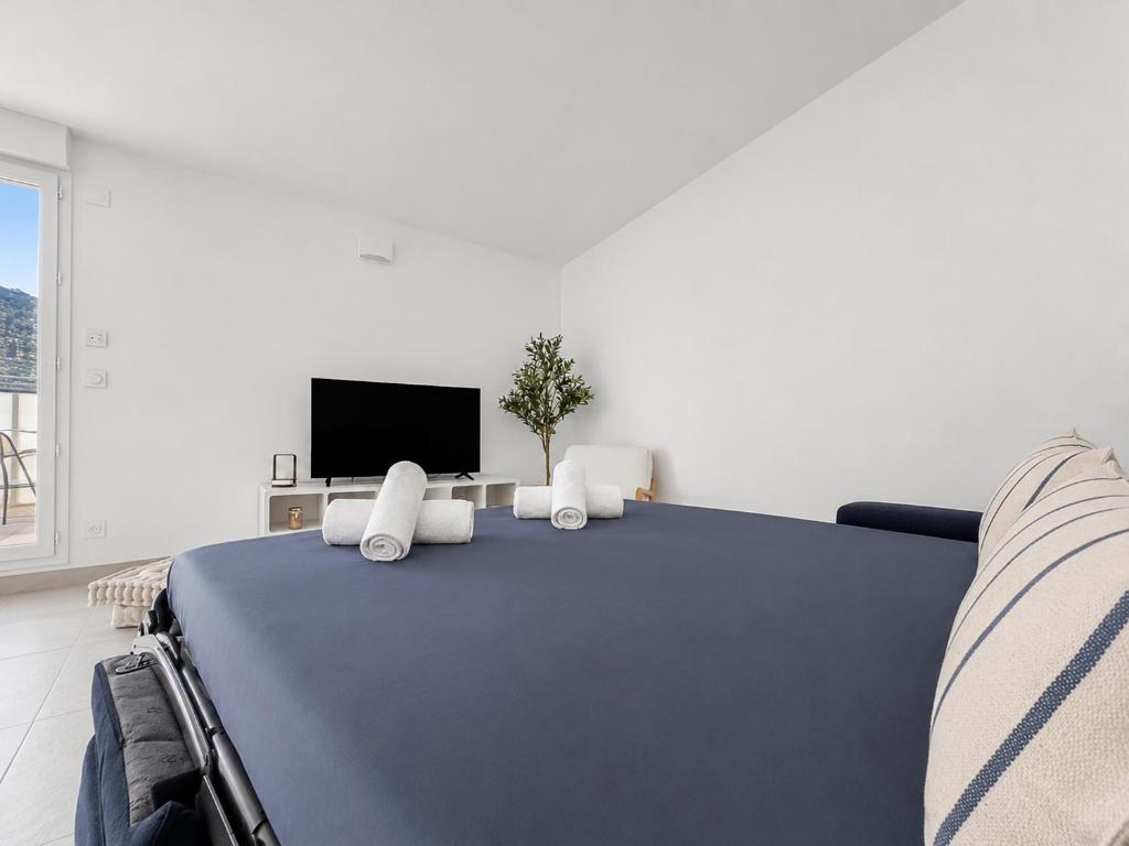 Élégant T2 avec piscine & balcon panoramique - 5