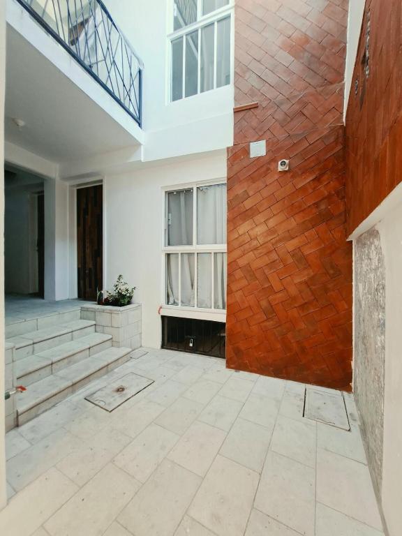 Casa Avelina Suite 103, Cocina, AC, baño privado - 1