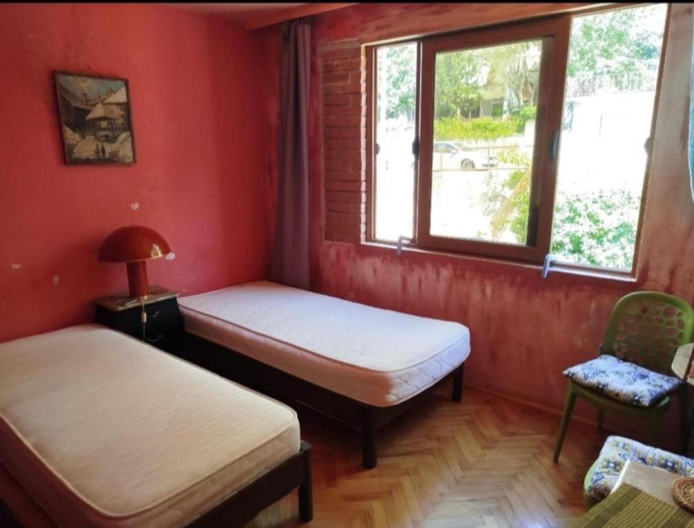 Room with two beds and shared bathroom - 1