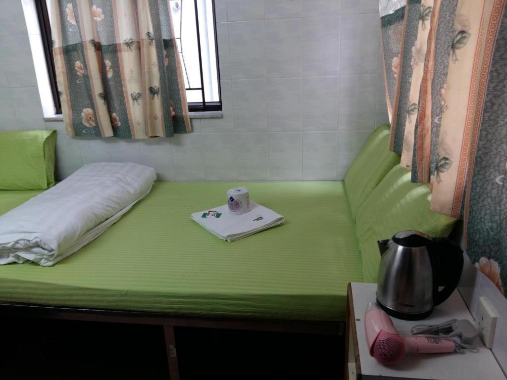 New Yan Yan Guest House reception 9th floor Flat 호텔 이미지 2