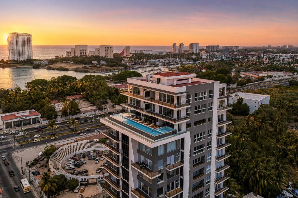 Ocean-view condo in Puerto Vallarta with rooftop pool, fitness room, and balcony - 5