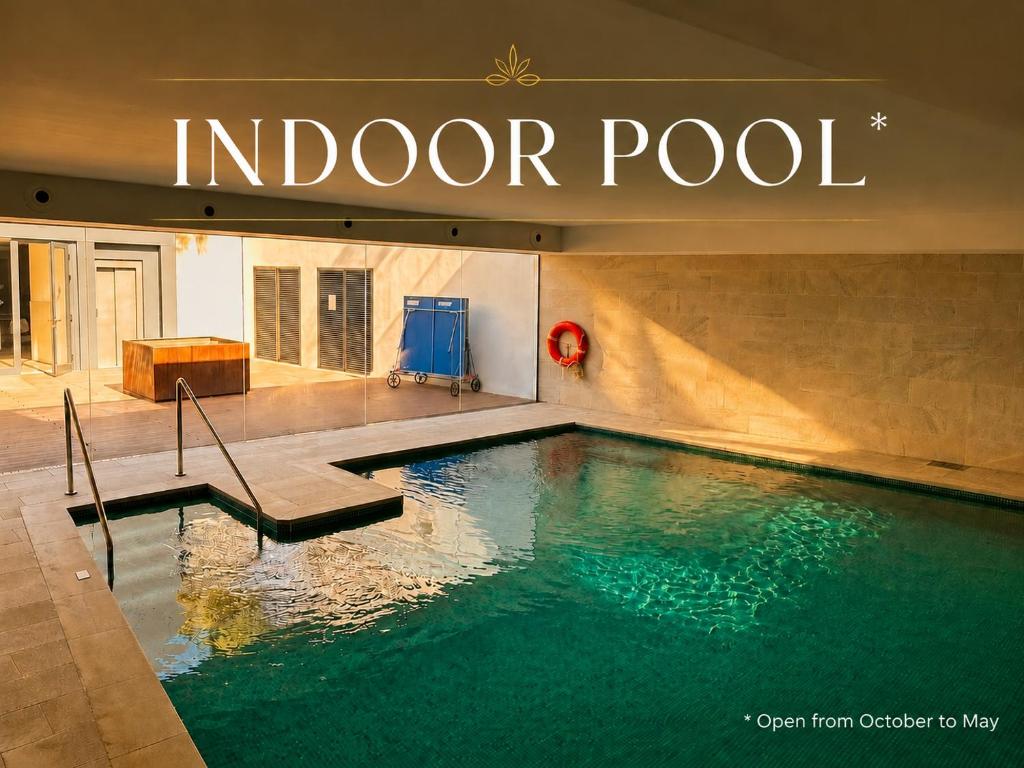 LolaBeachfront - Indoor Heated Pool & Spa - Premium Gym - Private Garden - 5 min Train to Airport - 5