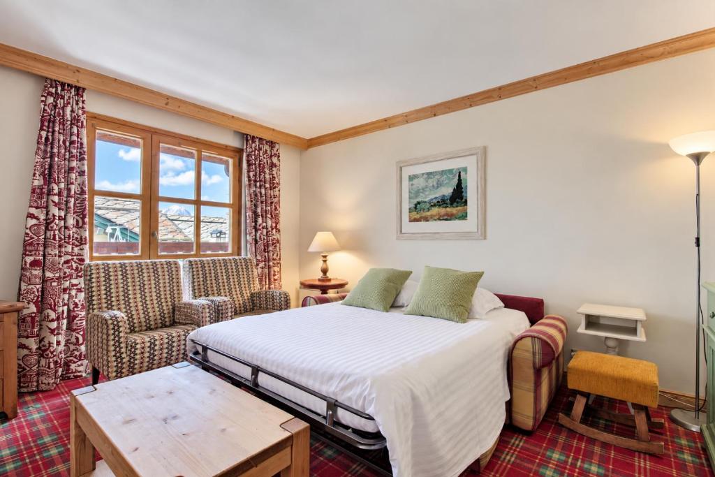 ARC 1950, Appartement 2 chambres, Duplex, Cheminée, 6 pers, Sauna, Hammam, Jacuzzi, Salle de fitness, Piscine intérieure chauffée, Départ et retour skis aux pieds - 3