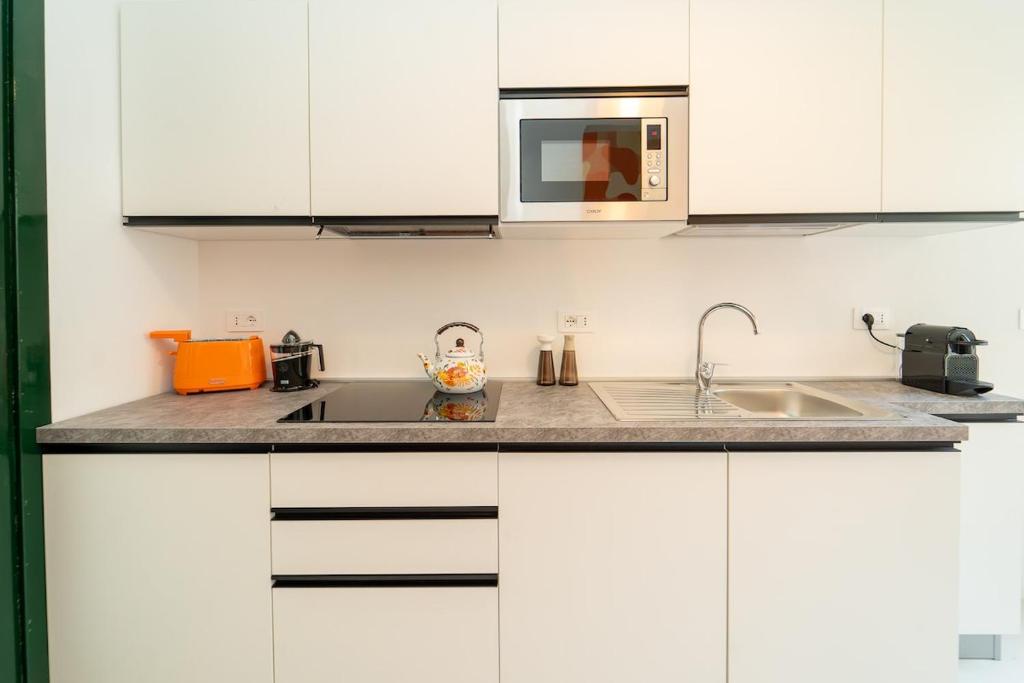 Spacious penthouse with terrace in the heart of Como - 3