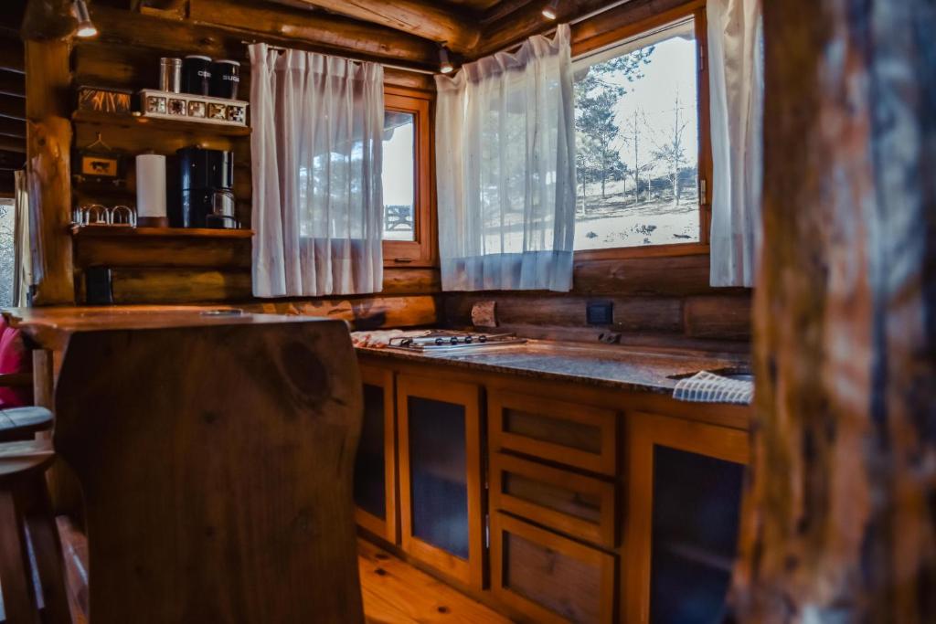 Cabaña con jacuzzi y río cerca de La Cumbrecita by Lofty - 1