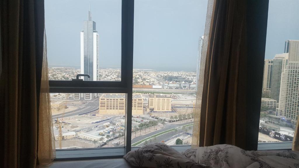 Downtown Apartments with Fountain and Burj Khalifa View photo