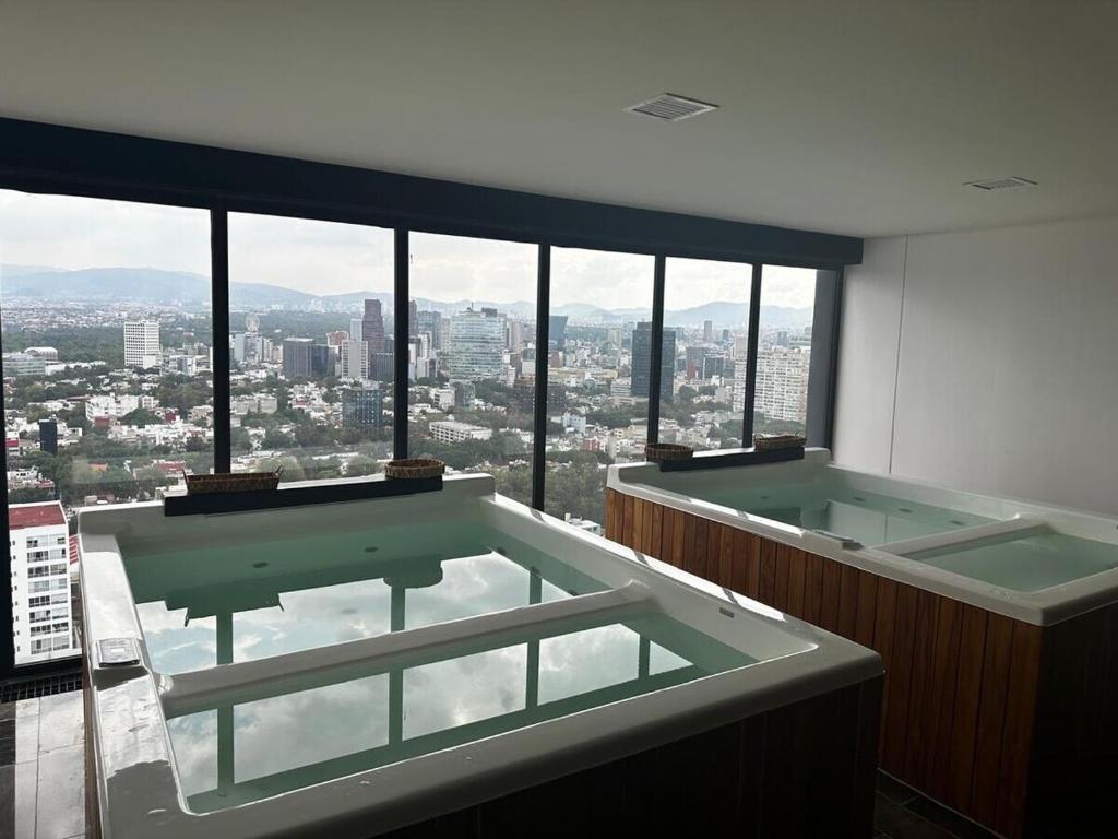 Moderno Loft con Coworking Ejecutivo, Jacuzzi & Gym - 1