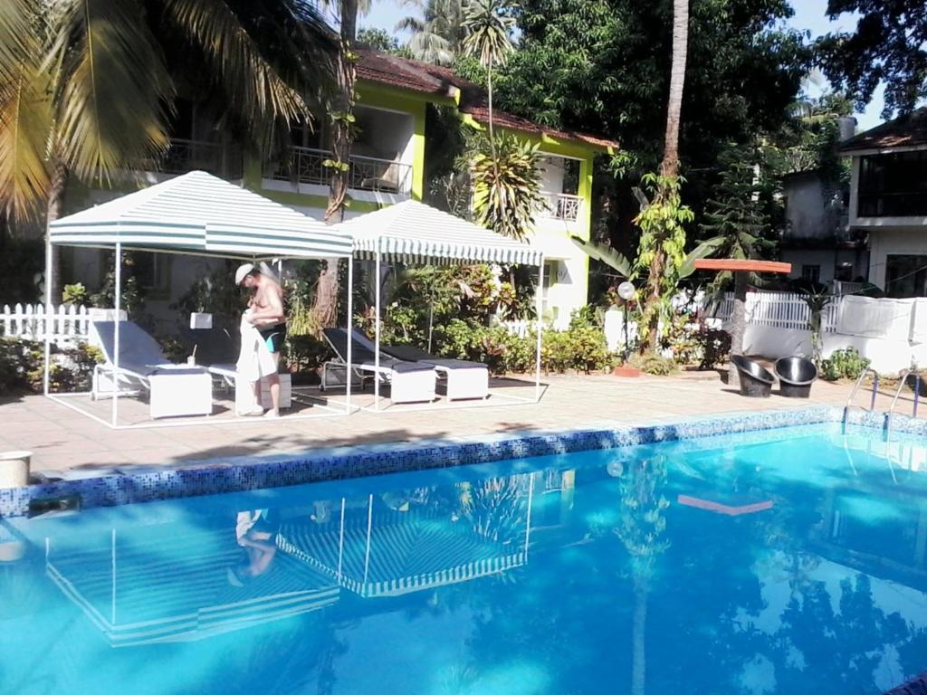 CALANGUTE BEACH VILLA # 3BHk # POOL # KITCHEN # 300MTS TO BEACH by GR Stays photo