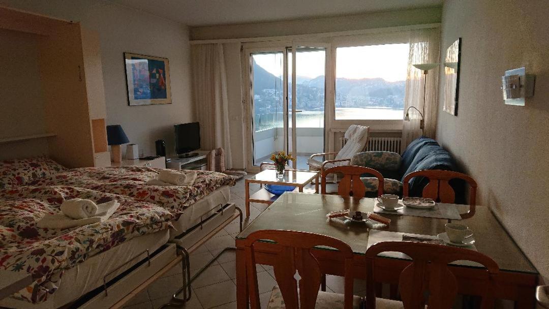 FLAT WITH AMAZING VIEW OVER THE GULF OF LUGANO