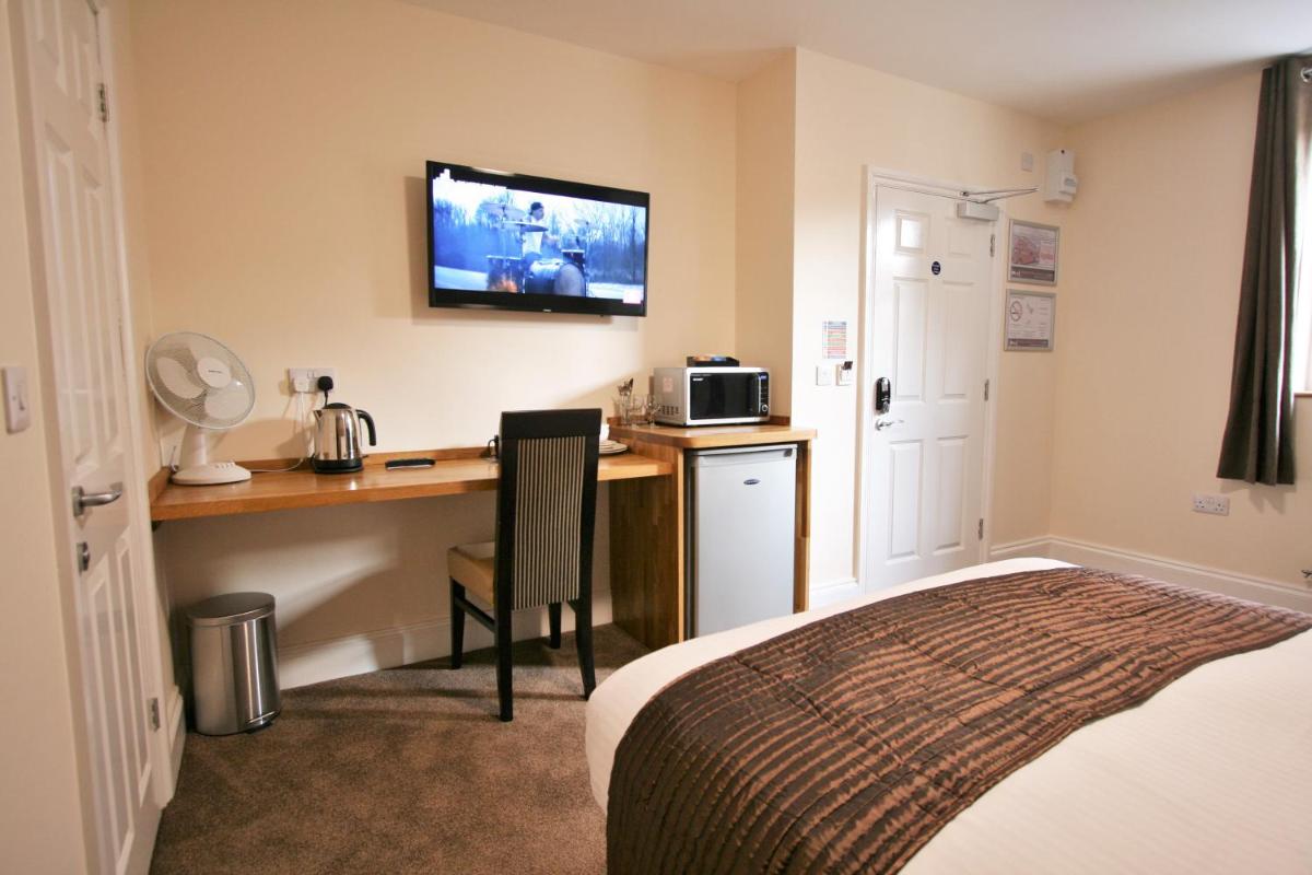 Photo - New County Hotel & Serviced Apartments by RoomsBooked