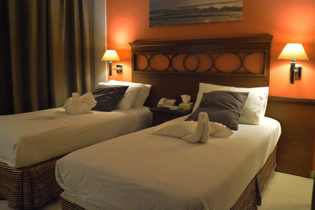 Foto - Capri Hotel Suites