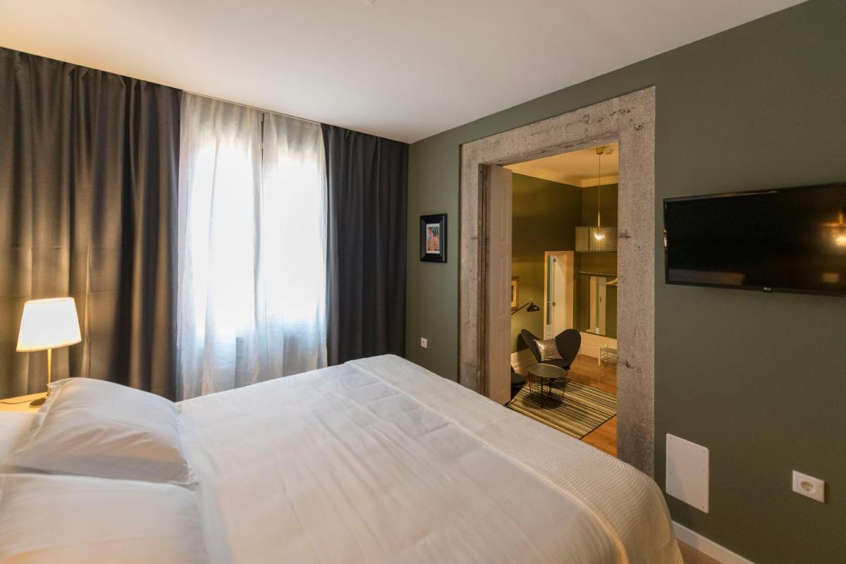 Foto - Guesthouse Bonjardim Suites by LovelyStay