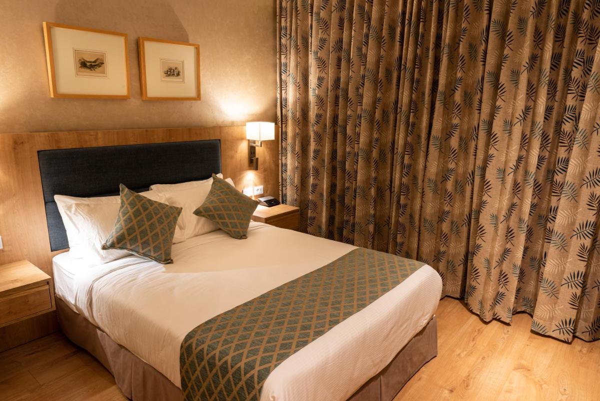 Foto - Ambassador Boutique Hotel