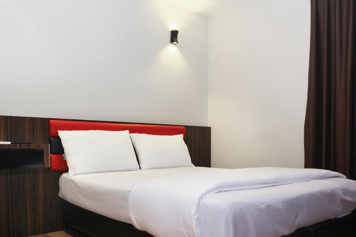 Foto - OYO 90027 Happy Hotel