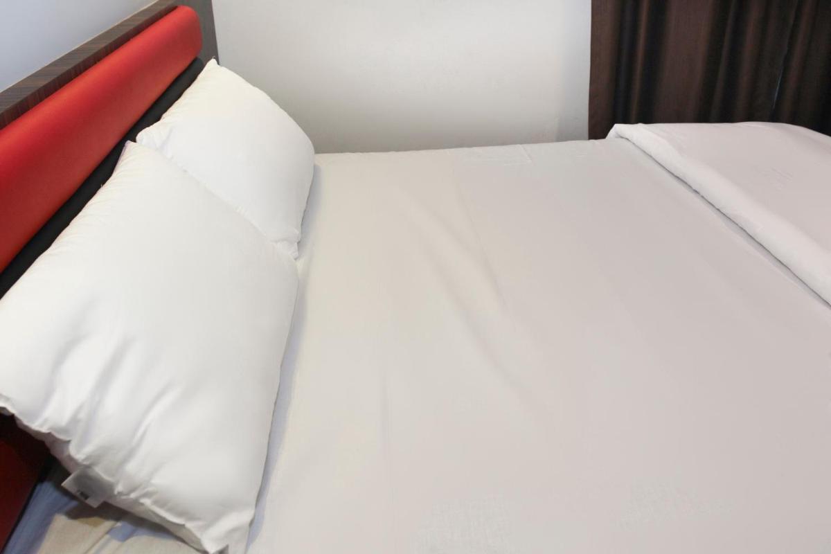 Foto - OYO 90027 Happy Hotel