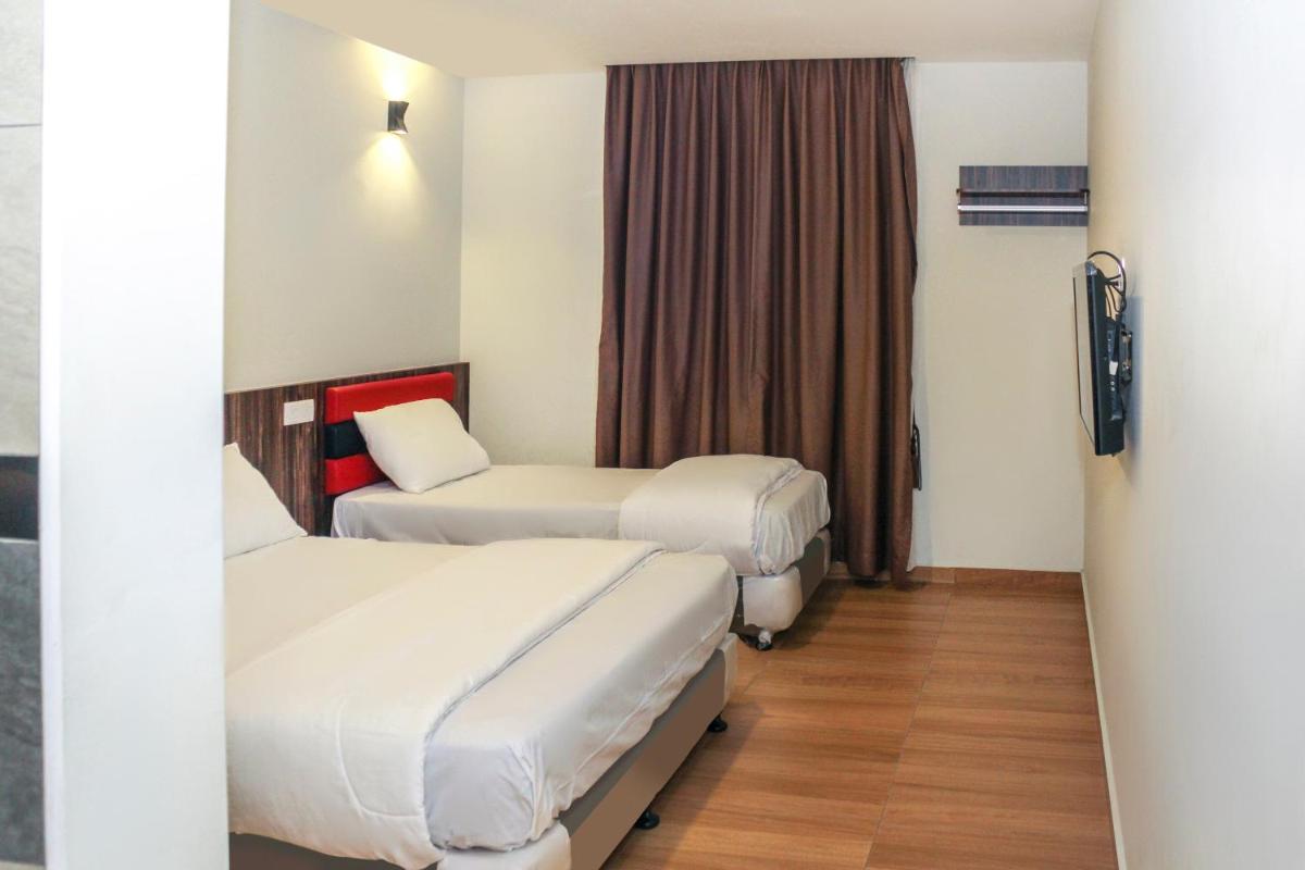 Foto - OYO 90027 Happy Hotel