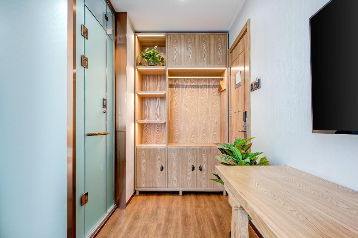 Foto - Happy Dragon City Culture Hotel -In the city center with ticket service&food recommendation,Near Tia