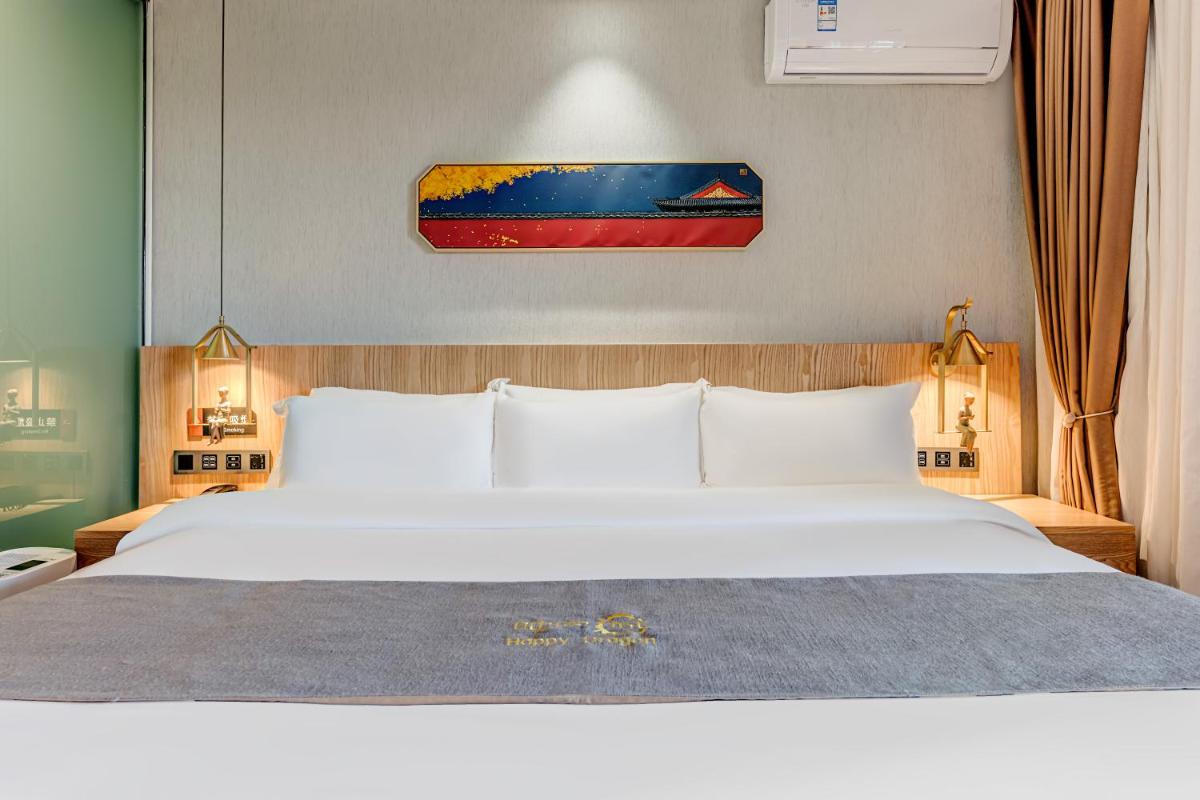 Foto - Happy Dragon City Culture Hotel -In the city center with ticket service&food recommendation,Near Tia