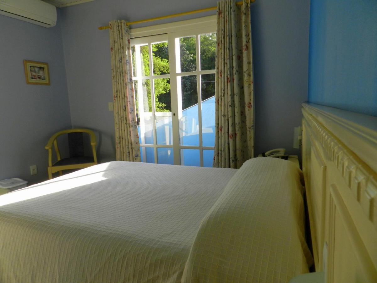 Foto - Pousada Jardim Azul