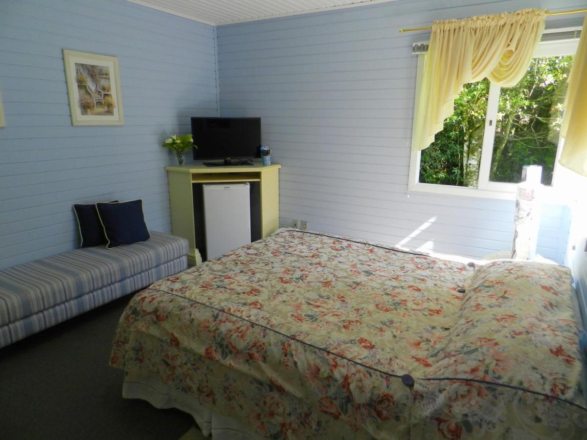 Foto - Pousada Jardim Azul