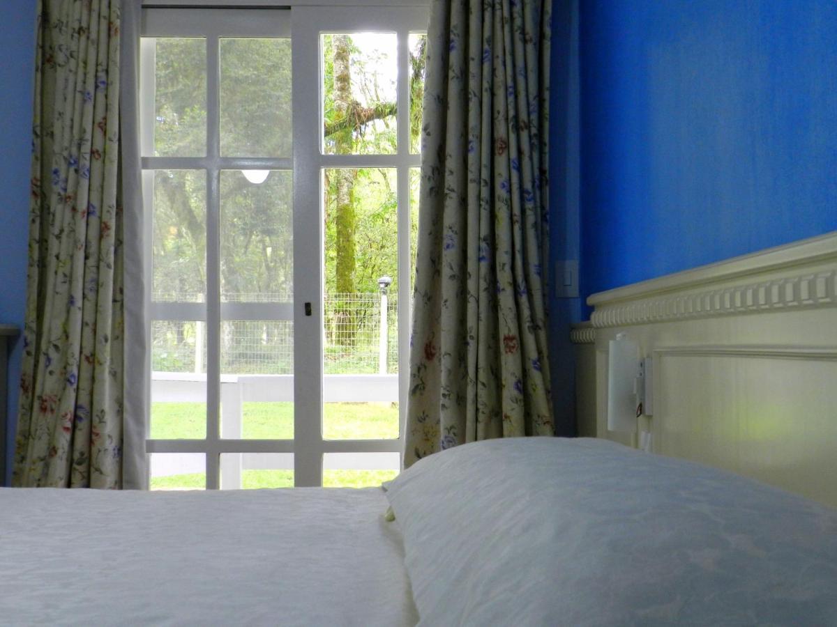 Foto - Pousada Jardim Azul