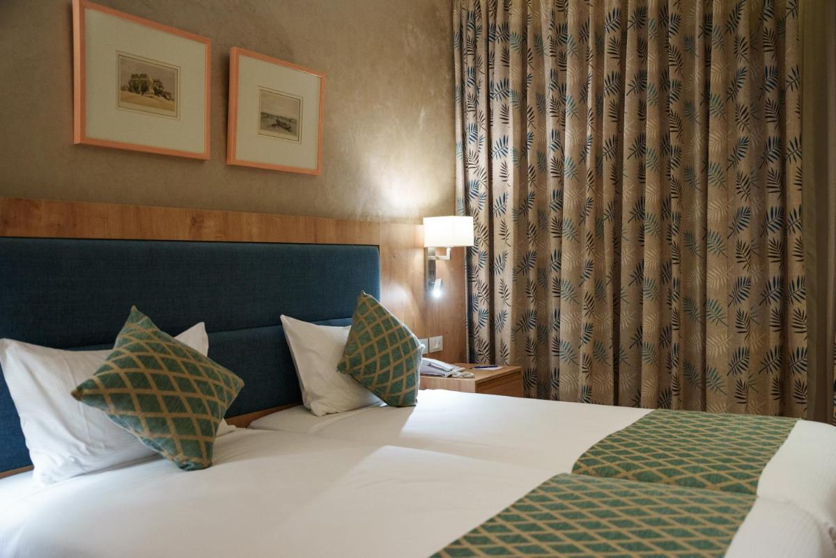 Foto - Ambassador Boutique Hotel