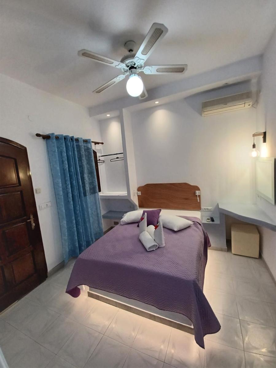 Foto - Evelina Beach Pension a breath away from the Black Beach offer private rooms&studios to suit every t