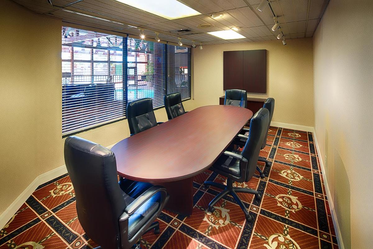 Meeting room with a long conference table and chairs at Red Lion Hotel & Conference Center St. George