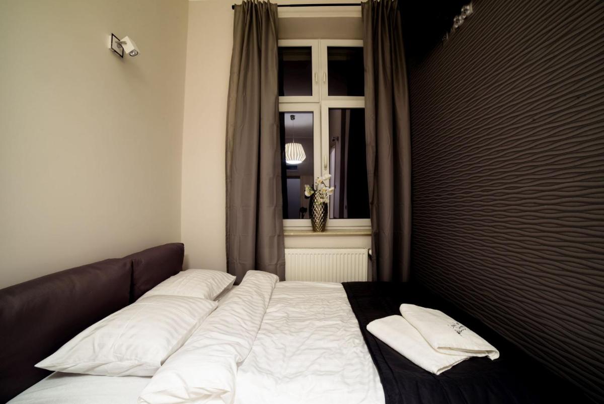 Foto - Cracow Rent Apartments - spacious apartments for 2-7 people in quiet area - Kolberga Street nr 3 - 1