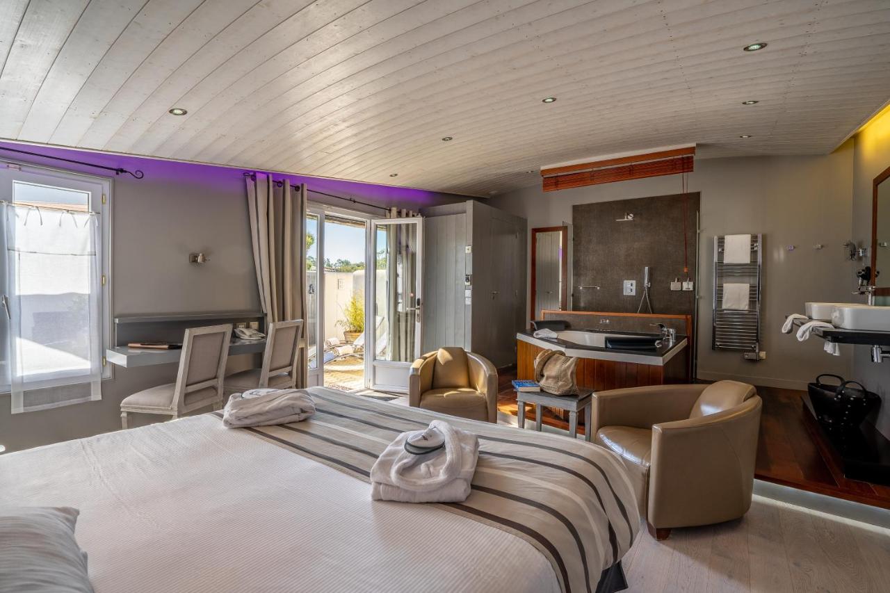 Foto - Elégance Suites Hôtel