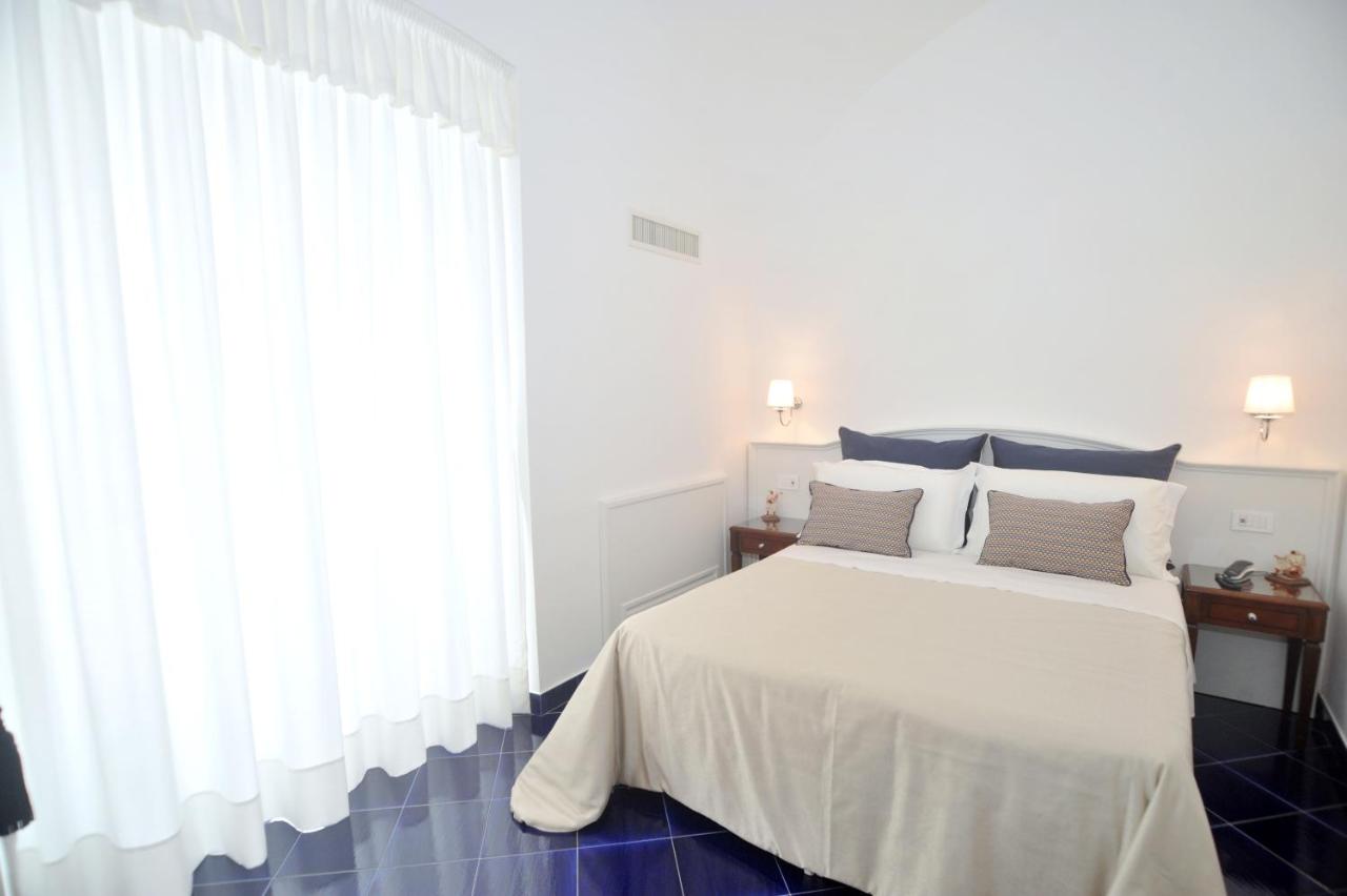 Core Amalfitano City Suites - 6
