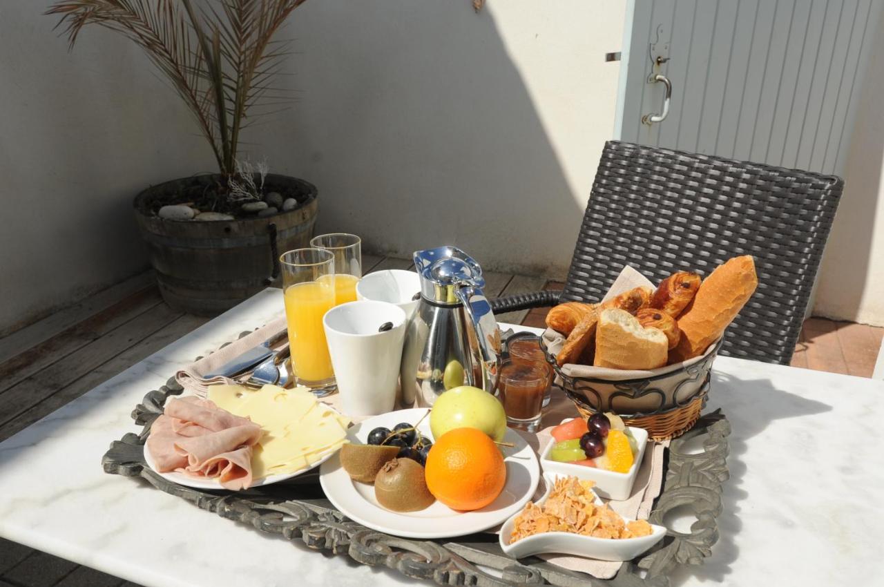 Foto - Elégance Suites Hôtel