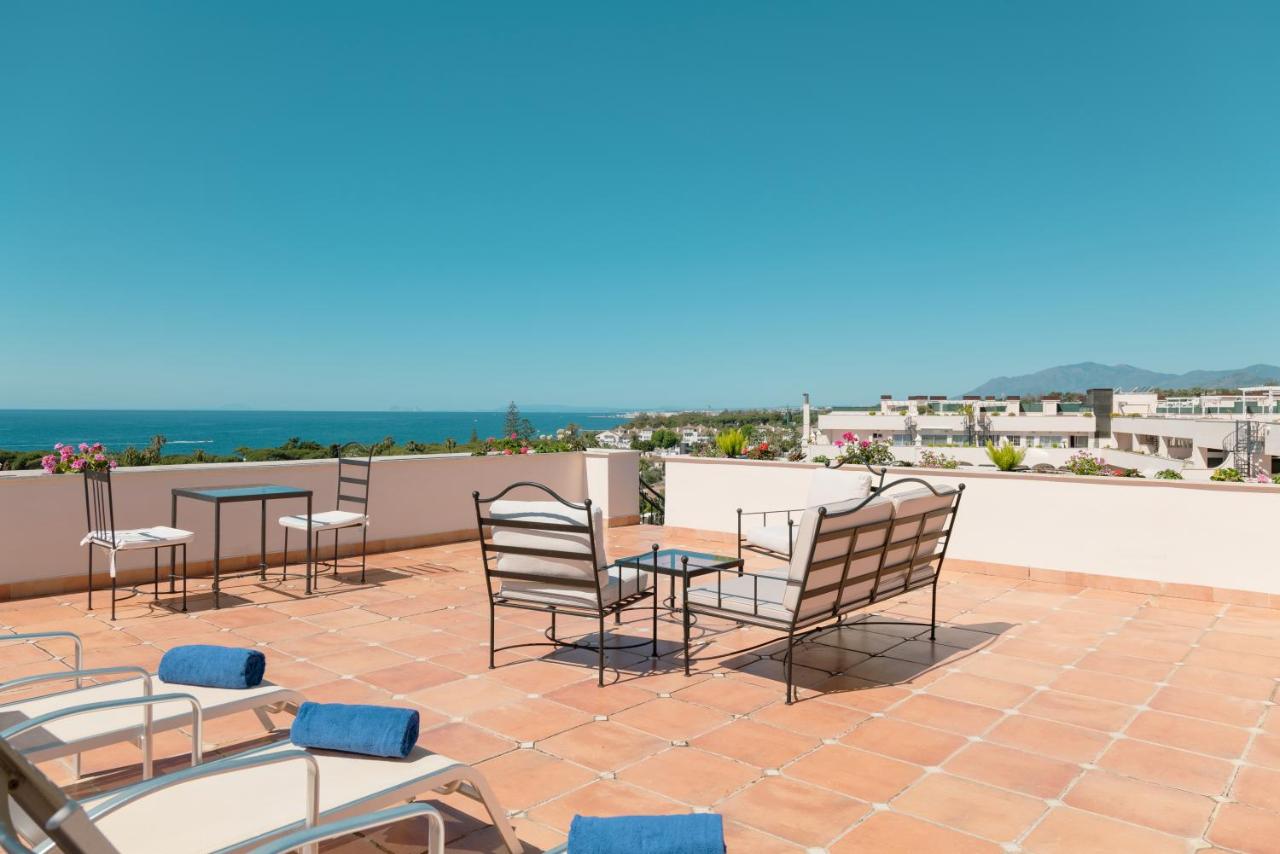 Apartamentos Guadalpin Suites photo 2